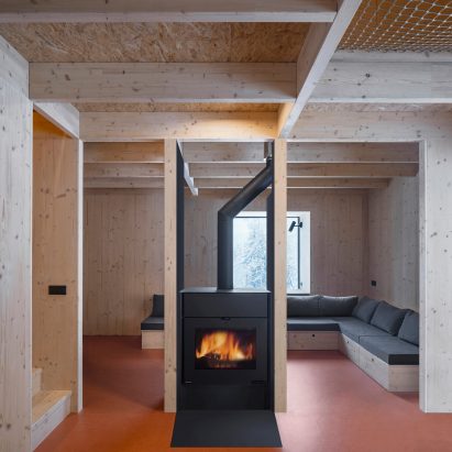Log burner in wooden interior