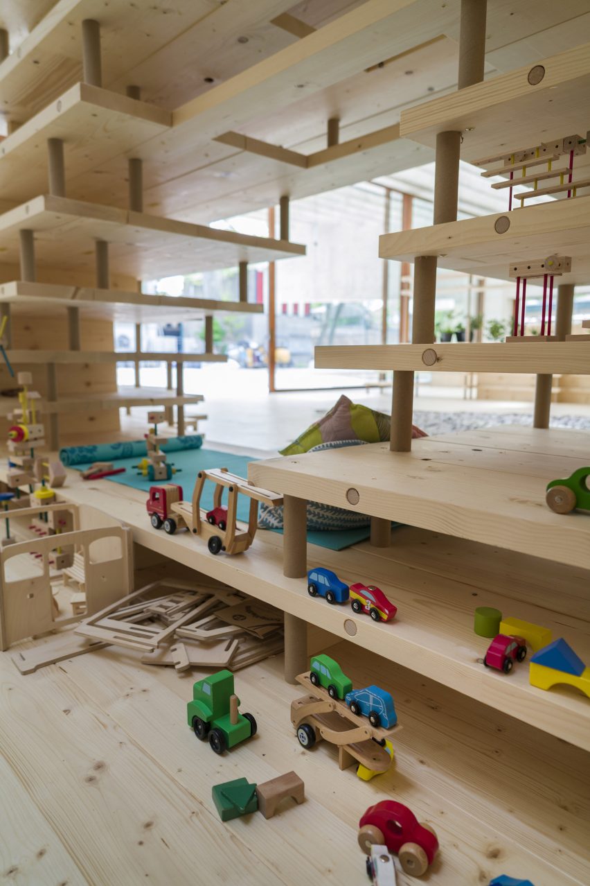 A wooden play area inside the What We Share exhibition