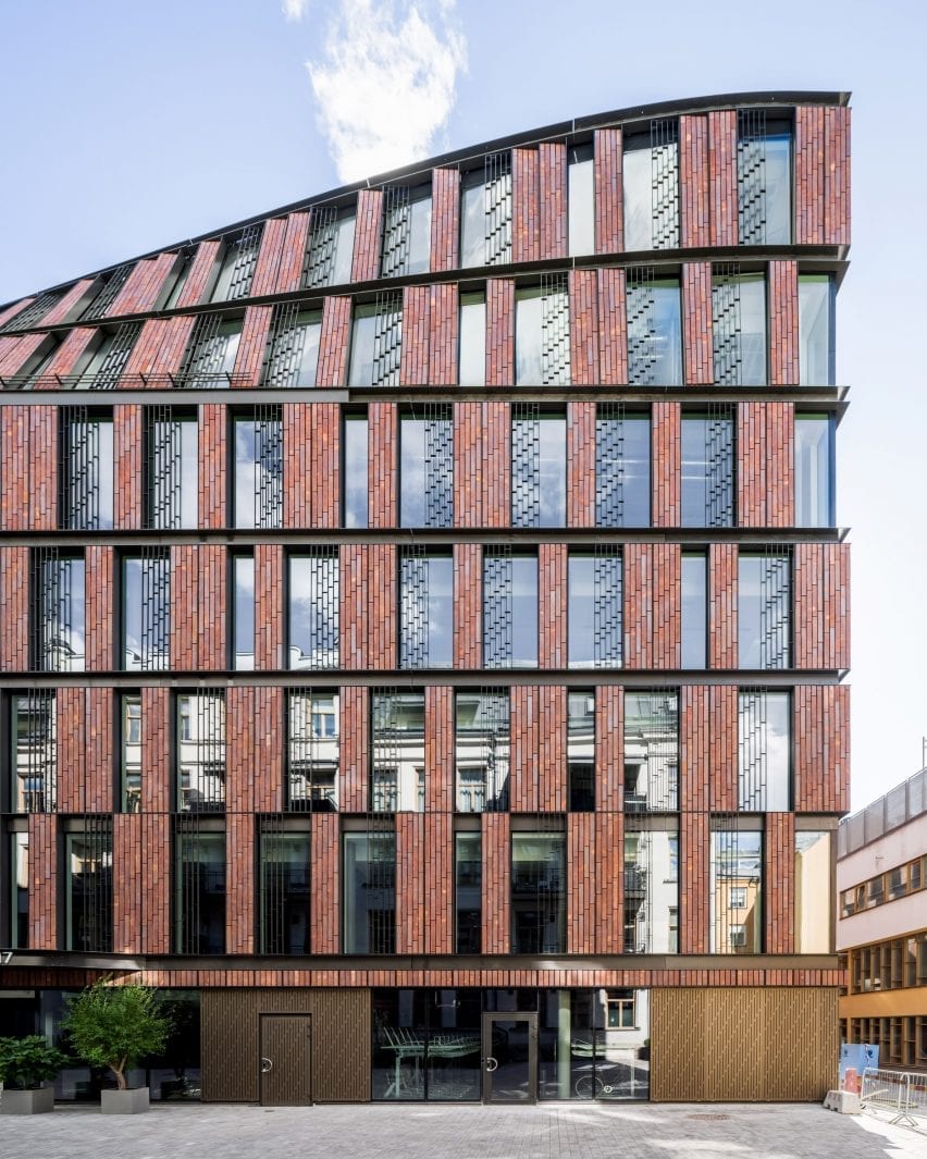 The roofline curves away from the building