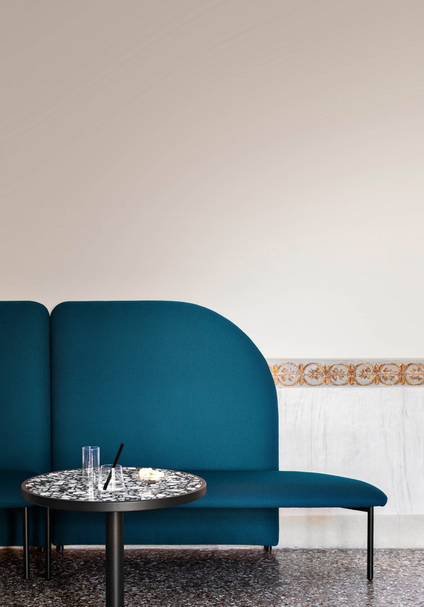 Upholstered bench by Miniforms with terrazzo coffee table