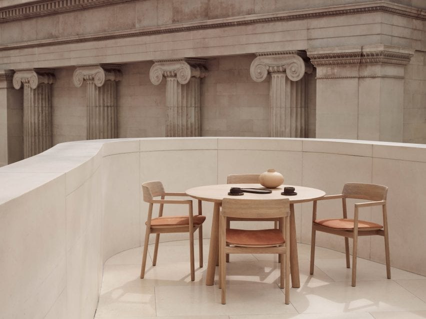 The chairs are place around a circular table