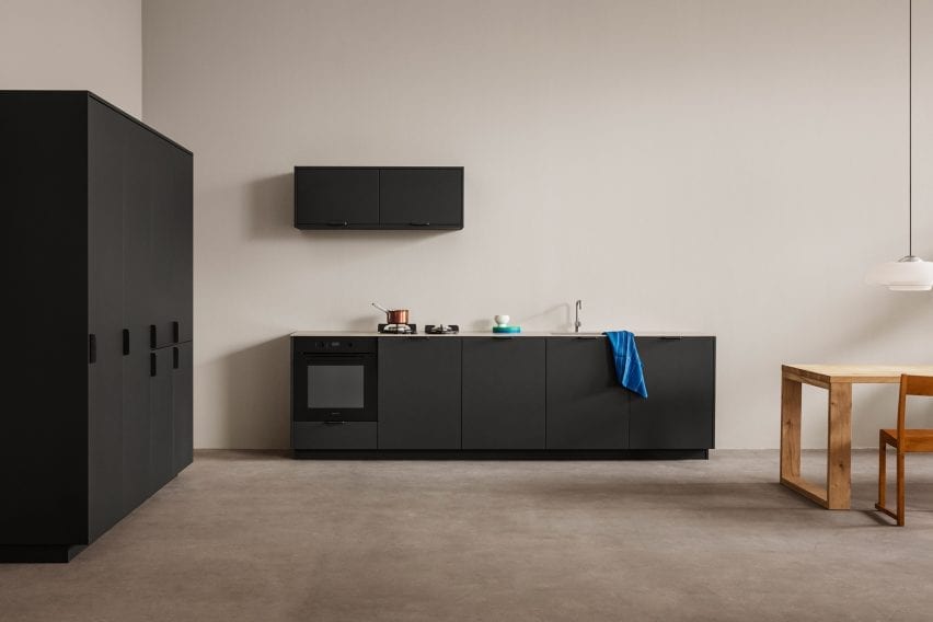 Matt black kitchen by Reform