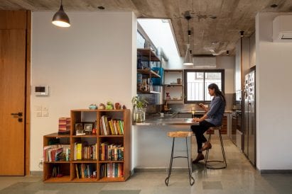 Board formed concrete covers the ceiling at The Safdarjang Residence