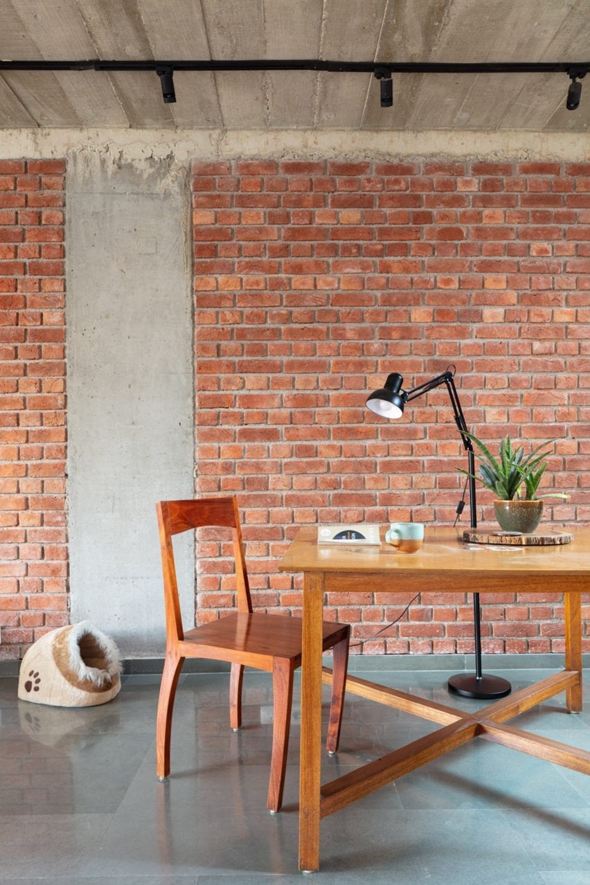 Brick and concrete covers the walls