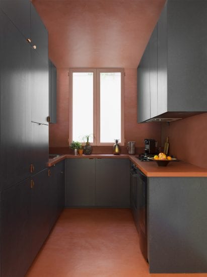 Red and black U-shaped kitchen