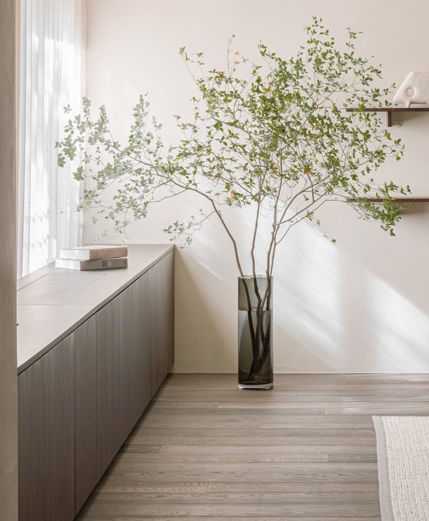 Wooden floor with green plant