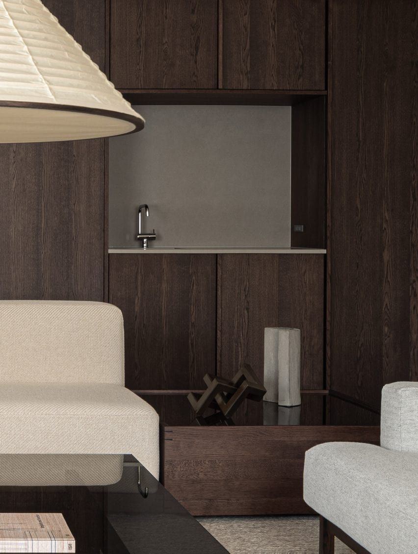 Dark wood panelling in living room
