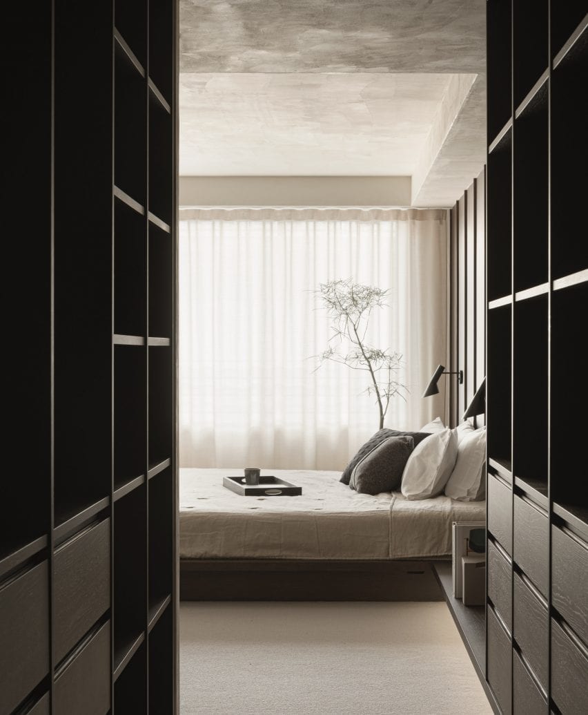 Bedroom storage cabinets in dark wood