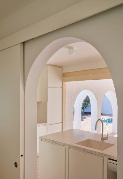Archways lead between spaces at las 3 Marías