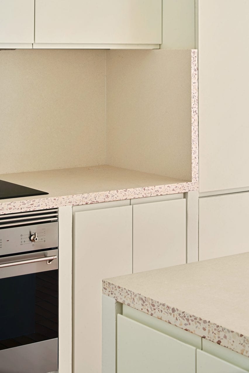 The kitchen has terrazzo countertops