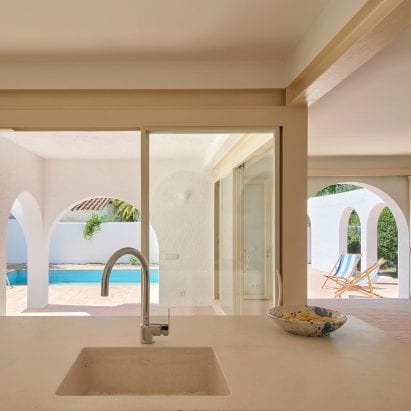 The kitchen space has a light and airy look