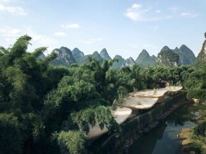 The pavilion is pictured beneath the mountains