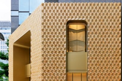 The store by Klein Dytham Architecture has a golden tone
