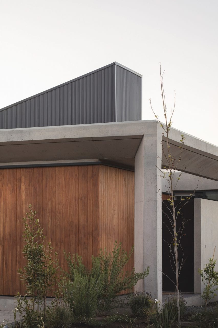 Angled concrete columns at the corner of the building