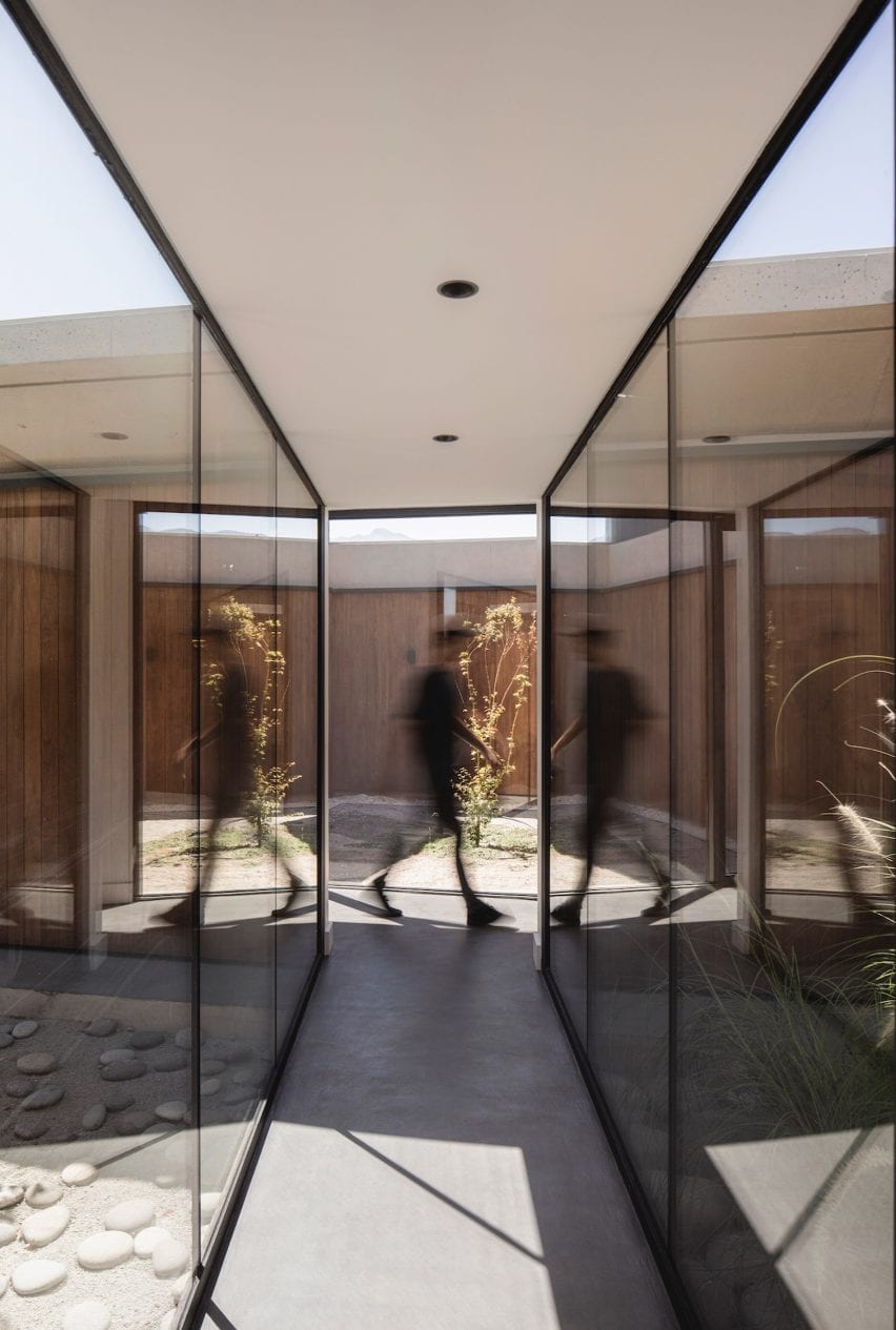 Covered walkway with glass on either side