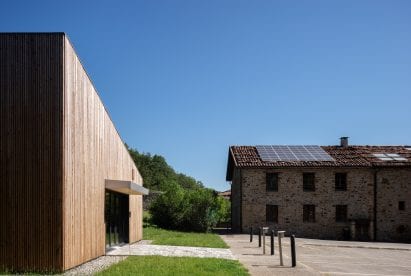 Traditional buildings surround pilgrims house