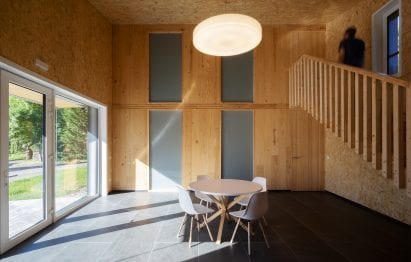 A staircase leads to bedrooms