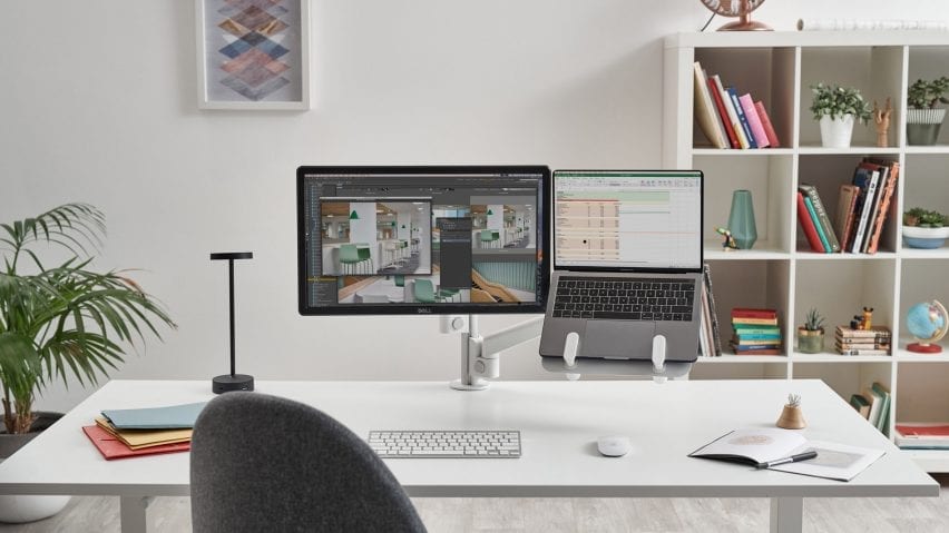 Colebrook Bosson Saunders' desk set up with Lolly desk light and laptop mount