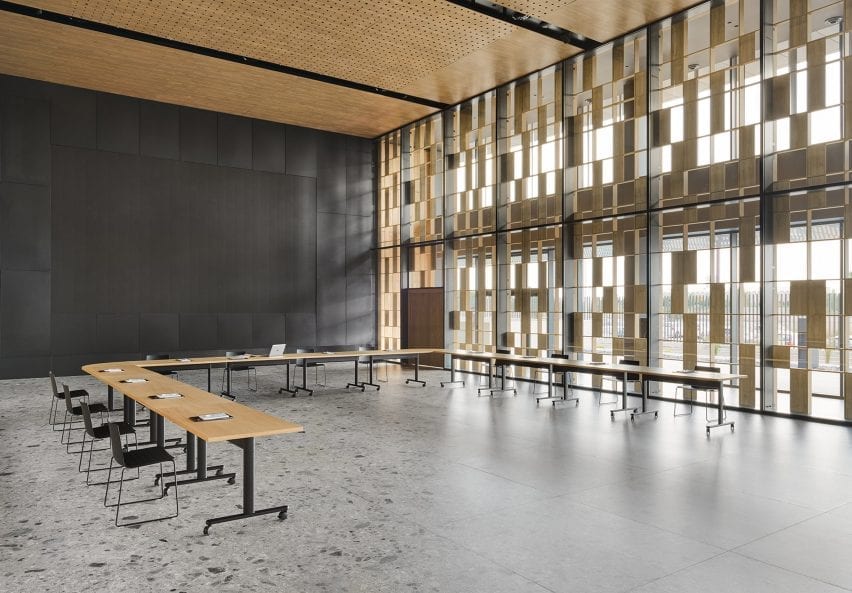 Series of Connect Tables that are joined in a U-shape in a hall