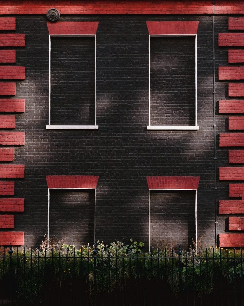 Bricked-up windows of a black house in London