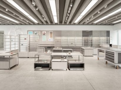 Shop interior by Daytrip with low display tables and a row of shelves