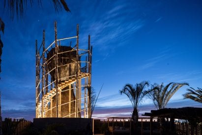 Hourglass observatory lit up at night
