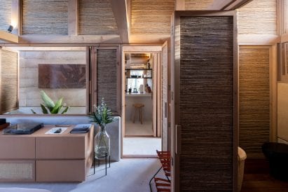 Hotel interiors thatch wood and concrete