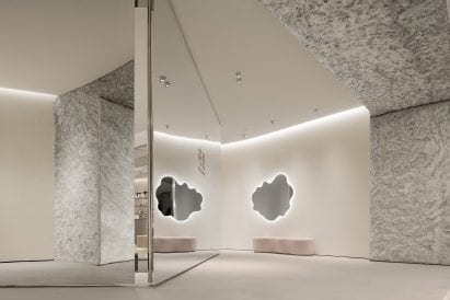Mirrored surfaces were used throughout ToSummer Living Room