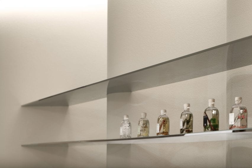 Fragrances lined on a shelf