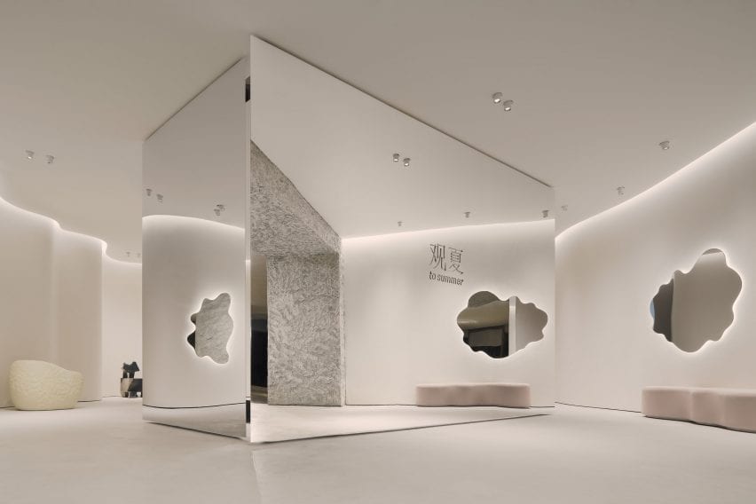 A mirrored volume was placed at the front of the store