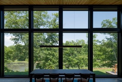 The architects positioned the bungalow close to the water