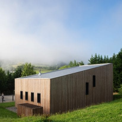 The building has a mono pitched roof