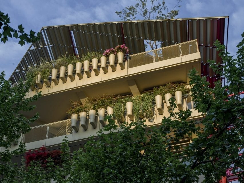 Planters line the balconies