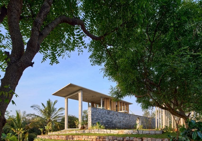View through trees of Ksaraah house in Bangalore by Taliesyn