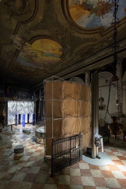 The Planet of People pavilion sits beneath a painted ceiling