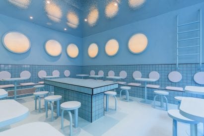 Masquespacio designed a swimming pool seating area