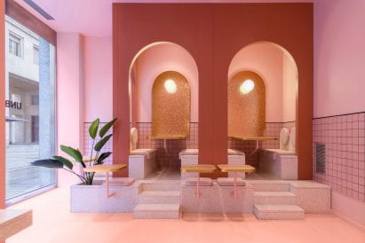 A planter features in the pink seating area