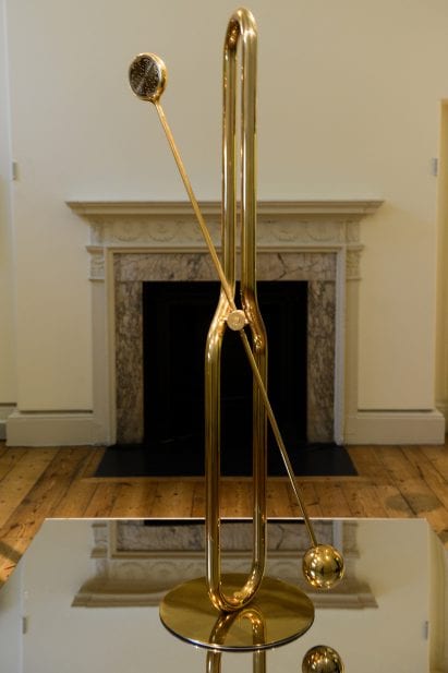 A soundscape accompanies the swinging structure