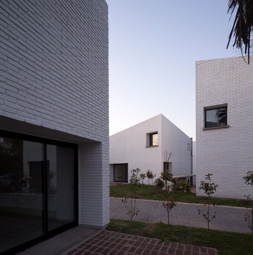 Brick homes with angled roofs