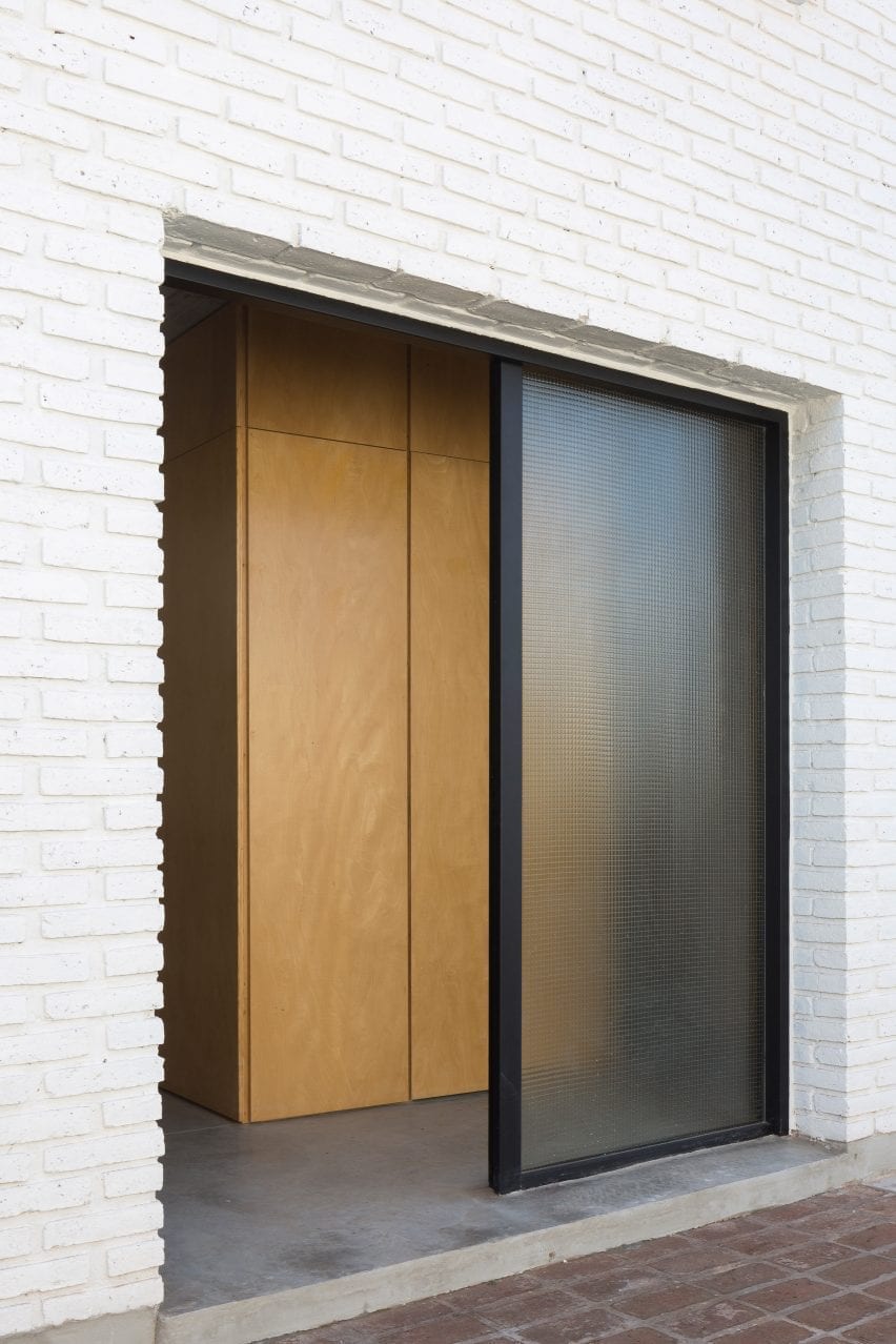 Brick wall with glass door