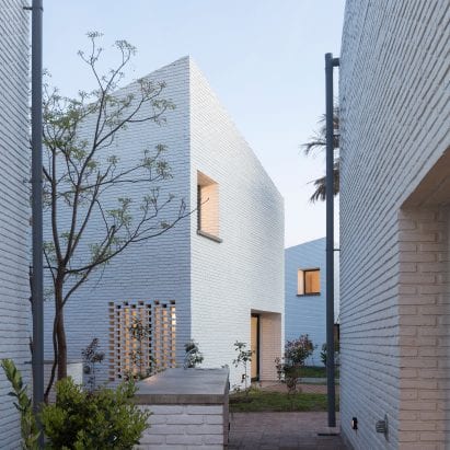 BBOA creates homes with slanted roofs for Morrison complex in Argentina