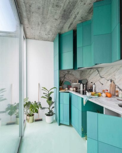 Fala Atelier oriented the one-wall kitchen toward a courtyard