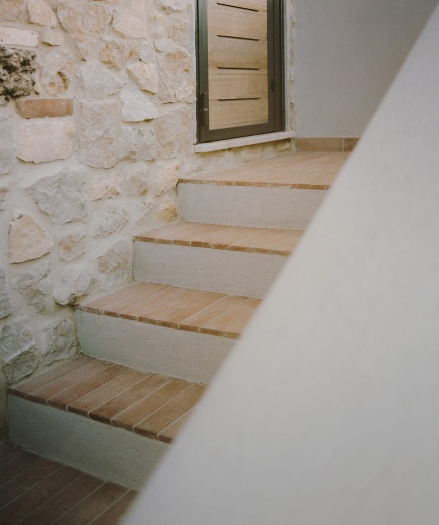 Tiles line the exterior staircase