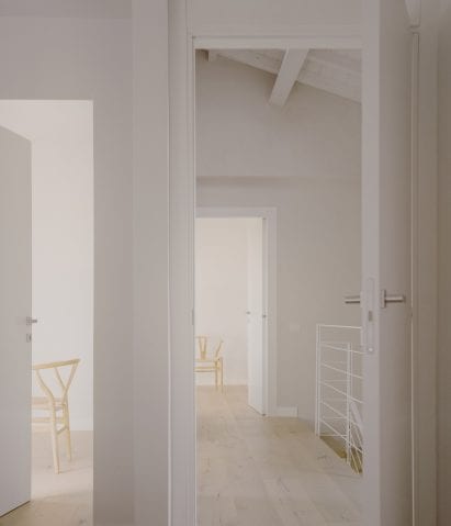 Light wood covers the floors of the Casamanda residence