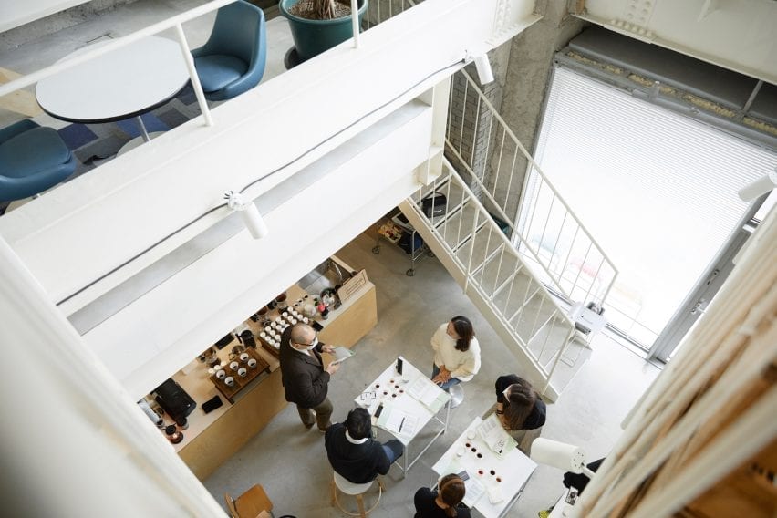 A white staircase links two floors