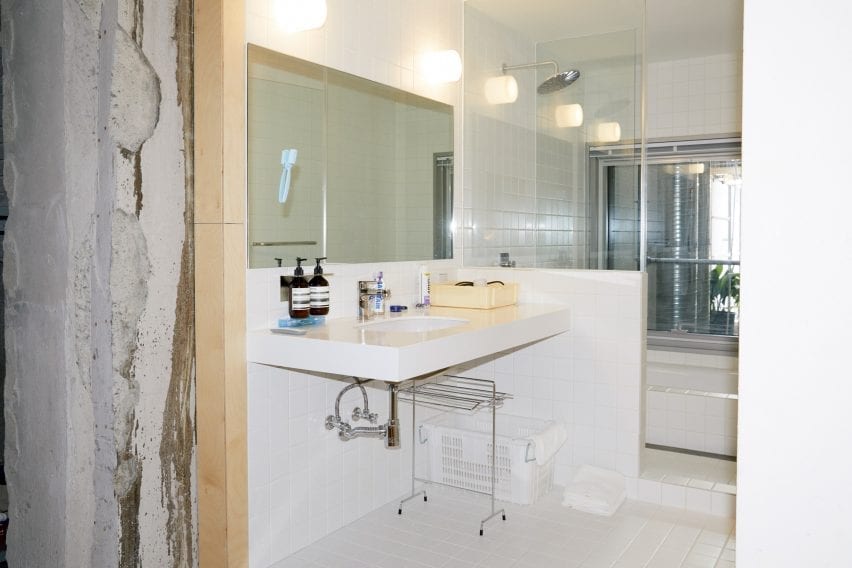 The bathroom has a bright look