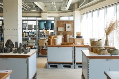 Objects are placed a top crate-like tables