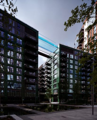 Swimming pool connecting two buildings