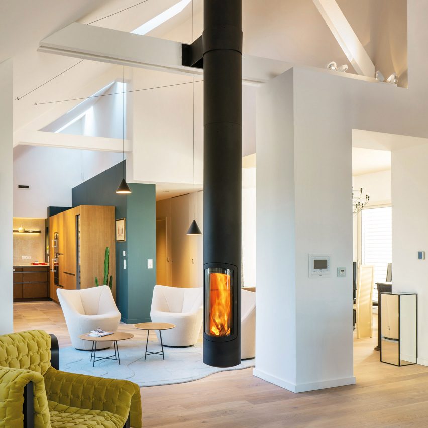 A suspended wood-burning fireplace