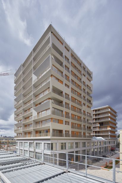 A concrete-clad apartment block in Paris